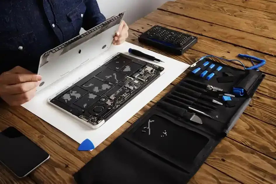 Apple laptop opened for internal repair and inspection for repair appointments serving Small Heath, Birmingham