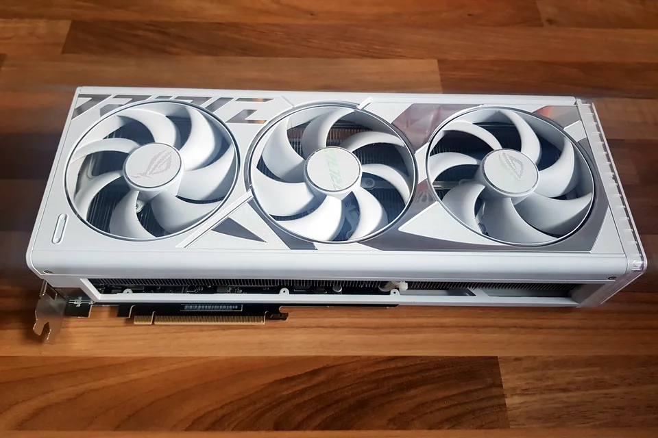 PC Turns On but No Display in Birmingham: What to Check First White graphics card on a Birmingham repair bench ready for display-output testing