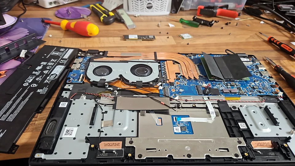 Laptop being diagnosed on a computer repair bench in Birmingham