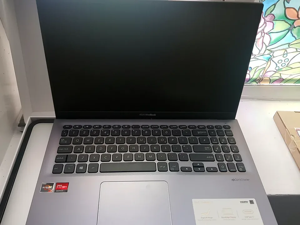 Laptop Screen Flickering, Showing Lines or Going Dim: What to Check Laptop display being checked for flickering lines and dim-screen faults at PC Repair Guru Birmingham