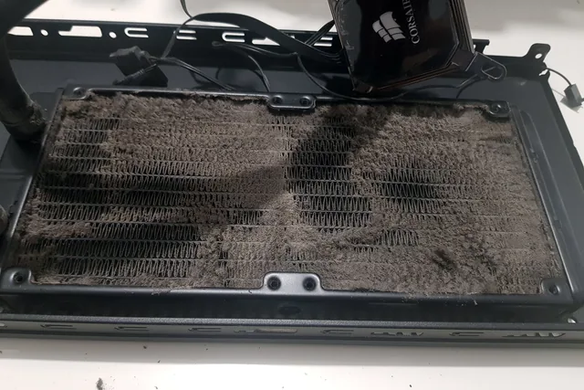 Laptop and PC cooling problems being checked during repair in Birmingham